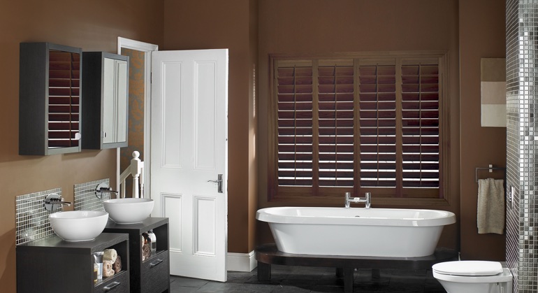 Stained wood shutter in Cincinnati bathroom